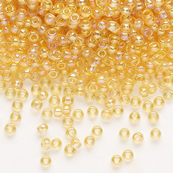 Seed bead, Preciosa Ornela, Czech glass, translucent rainbow light topaz, #8 rocaille. Sold per 50-gram pkg.