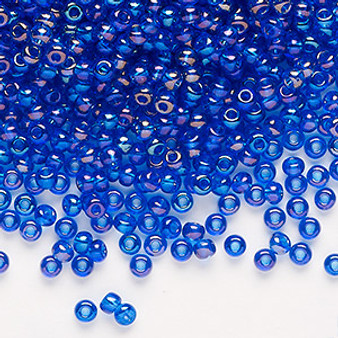 Seed bead, Preciosa Ornela, Czech glass, translucent rainbow sapphire blue, #8 rocaille. Sold per 50-gram pkg.
