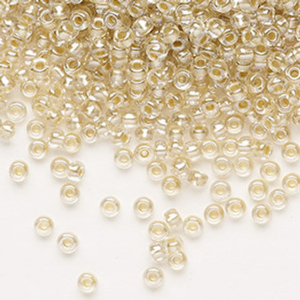 Seed bead, Preciosa Ornela, glass, translucent mocca pearl-lined crystal clear, #8 rocaille. Sold per 50-gram pkg.