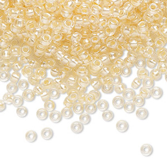 Seed bead, Preciosa Ornela, Czech glass, translucent color-lined pastel apricot luster, (382PA), #8 rocaille. Sold per 50-gram pkg.