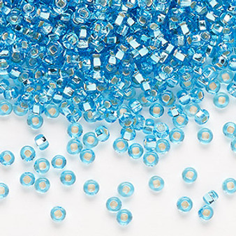 Seed bead, Preciosa Ornela, Czech glass, transparent silver-lined sky blue, #8 rocaille with square hole. Sold per 500-gram pkg.