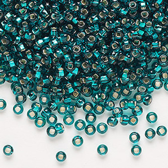 Seed bead, Preciosa Ornela, Czech glass, transparent silver-lined teal, #8 rocaille with square hole. Sold per 500-gram pkg.