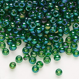 Seed bead, Preciosa Ornela, Czech glass, translucent rainbow medium green, #6 rocaille. Sold per 50-gram pkg.