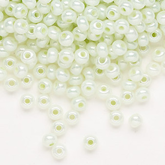 Seed bead, Preciosa Ornela, Czech glass, opaque luster pastel green, #6 rocaille. Sold per 50-gram pkg.