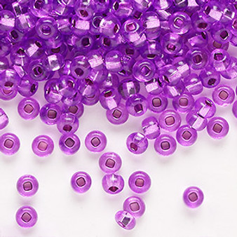 Seed bead, Preciosa Ornela, Czech glass, transparent silver-lined dark purple, #6 rocaille with square hole. Sold per 50-gram pkg.