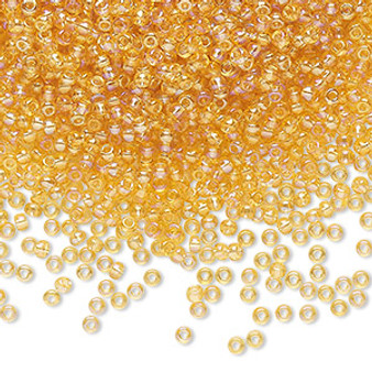 Seed bead, Preciosa Ornela, Czech glass, translucent rainbow light topaz (11020), #11 rocaille. Sold per 50-gram pkg.