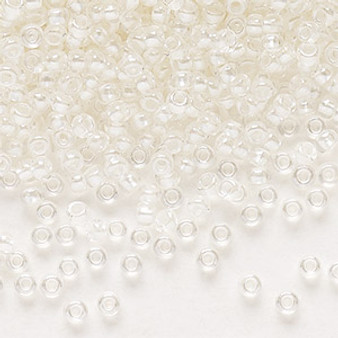 Seed bead, Preciosa Ornela, Czech glass, translucent color-lined pastel ivory luster, (382PI), #11 rocaille. Sold per 50-gram pkg.