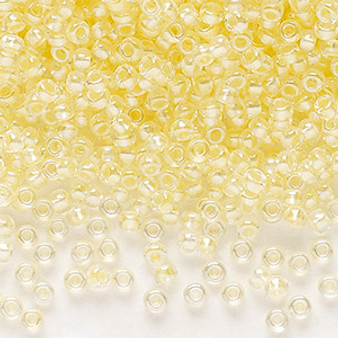 Seed bead, Preciosa Ornela, Czech glass, translucent color-lined pastel yellow luster, (382PY), #11 rocaille. Sold per 50-gram pkg.