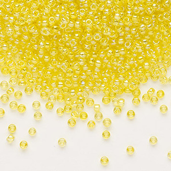 Seed bead, Dyna-Mites™, glass, transparent rainbow yellow, #11 round. Sold per 40-gram pkg.