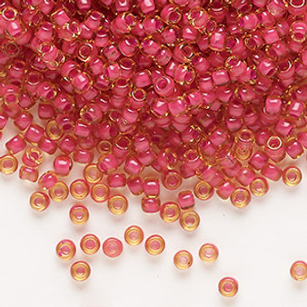 Seed bead, Dyna-Mites™, glass, translucent inside color fuchsia, #8 round. Sold per 40-gram pkg.