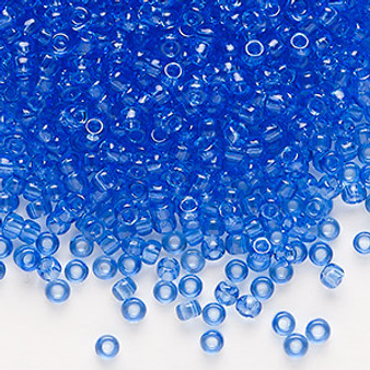 Seed bead, Dyna-Mites™, glass, transparent light blue, #8 round. Sold per 40-gram pkg.