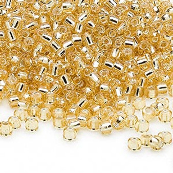 Seed bead, Dyna-Mites™, glass, silver-lined translucent light gold, #8 round. Sold per 40-gram pkg.