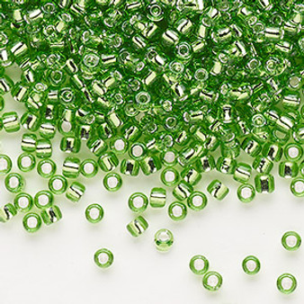 Seed bead, Dyna-Mites™, glass, silver-lined translucent green, #8 round. Sold per 40-gram pkg.