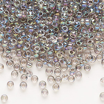 Seed bead, Dyna-Mites™, glass, translucent inside color rainbow peacock, #8 round. Sold per 40-gram pkg.