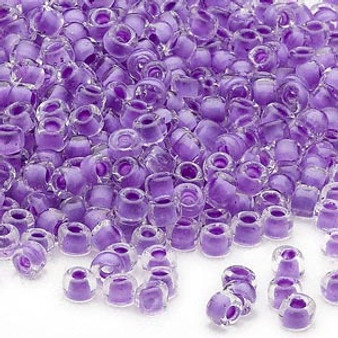 Seed bead, Dyna-Mites™, glass, translucent inside color dark lilac, #6 round. Sold per 40-gram pkg.