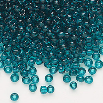 Seed bead, Dyna-Mites™, glass, transparent teal, #6 round. Sold per 40-gram pkg.