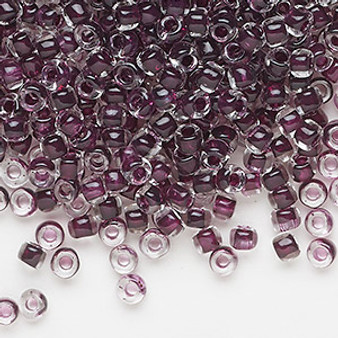 Seed bead, Dyna-Mites™, glass, translucent inside color dark mauve, #6 round. Sold per 40-gram pkg.