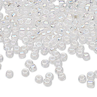 Seed bead, Dyna-Mites™, glass, transparent rainbow clear, #6 round. Sold per 40-gram pkg.