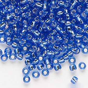 Seed bead, Dyna-Mites™, glass, silver-lined translucent light blue, #6 round. Sold per 40-gram pkg.