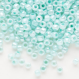 Seed bead, Dyna-Mites™, glass, opaque ceylon pastel blue, #6 round. Sold per 40-gram pkg.