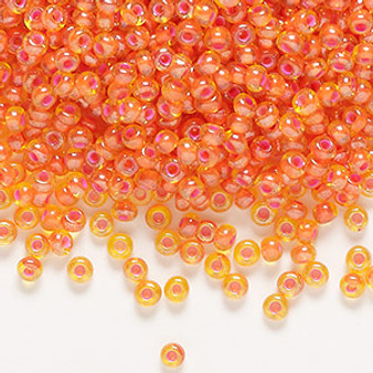 Seed bead, Preciosa Ornela, glass, translucent pink-lined luster yellow amber, #8 rocaille. Sold per 50-gram pkg.