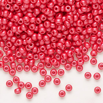Seed bead, Preciosa Ornela, Czech glass, opaque chalkwhite PermaLux dyed red, #8 rocaille. Sold per 50-gram pkg.