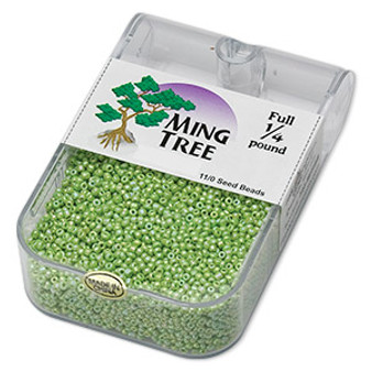 Seed bead, Ming Tree™, glass, opaque rainbow lime green, #11 round. Sold per 1/4 pound pkg.