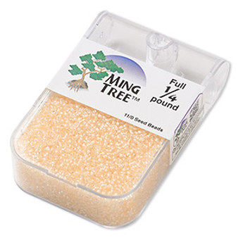 Seed bead, Ming Tree™, glass, transparent color-lined cream yellow, #11 round. Sold per 1/4 pound pkg.