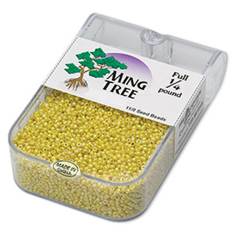 Seed bead, Ming Tree™, glass, opaque rainbow yellow, #11 round. Sold per 1/4 pound pkg.