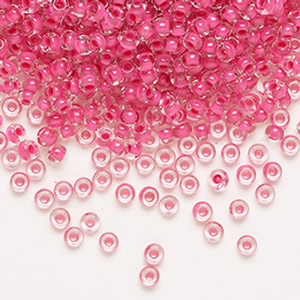 Seed bead, Preciosa Ornela Czech glass, transparent terra intensive pink-lined clear, #8 rocaille. Sold per 50-gram pkg.