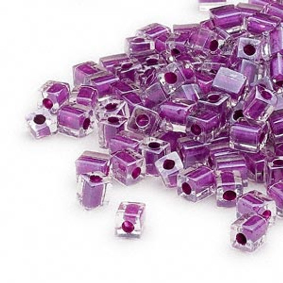SB4-243 - Miyuki - 4mm - Clear Colour Lined Purple - 25gms - 4mm Square Glass Bead