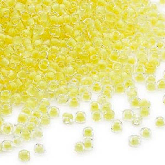 Seed bead, Dyna-Mites™, glass, translucent inside color yellow, #11 round. Sold per 40-gram pkg.