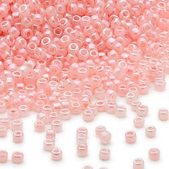 Seed bead, Dyna-Mites™, glass, opaque ceylon pastel pink, #11 round. Sold per 40-gram pkg.