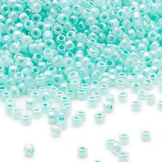 Seed bead, Dyna-Mites™, glass, opaque ceylon pastel blue, #11 round. Sold per 40-gram pkg.