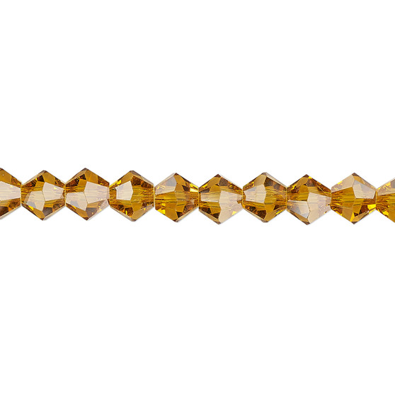 6mm - Celestial Crystal® - Transparent Gold - 15.5" Strand - Faceted Bicone Crystal