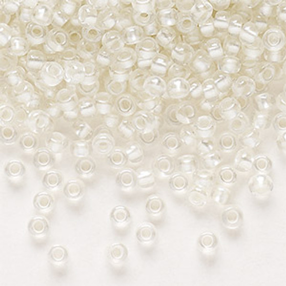 Seed bead, Preciosa Ornela, Czech glass, translucent color-lined pastel ivory luster, (382PI), #8 rocaille. Sold per 50-gram pkg.