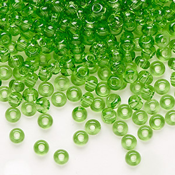 Seed bead, Preciosa Ornela, Czech glass, transparent light green, #6 rocaille. Sold per 50-gram pkg.