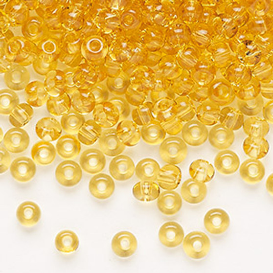 Seed bead, Preciosa Ornela, Czech glass, transparent light topaz, #6 rocaille. Sold per 50-gram pkg.