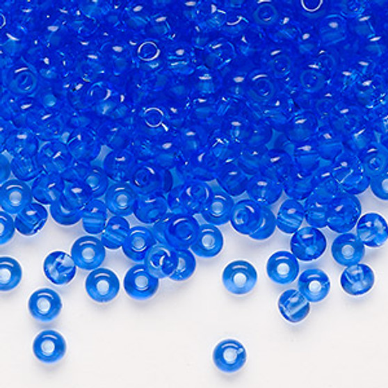 Seed bead, Preciosa Ornela, Czech glass, transparent light blue, #6 rocaille. Sold per 50-gram pkg.