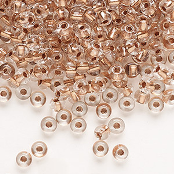 Seed bead, Preciosa Ornela, Czech glass, transparent copper-lined clear, #6 rocaille. Sold per 50-gram pkg.