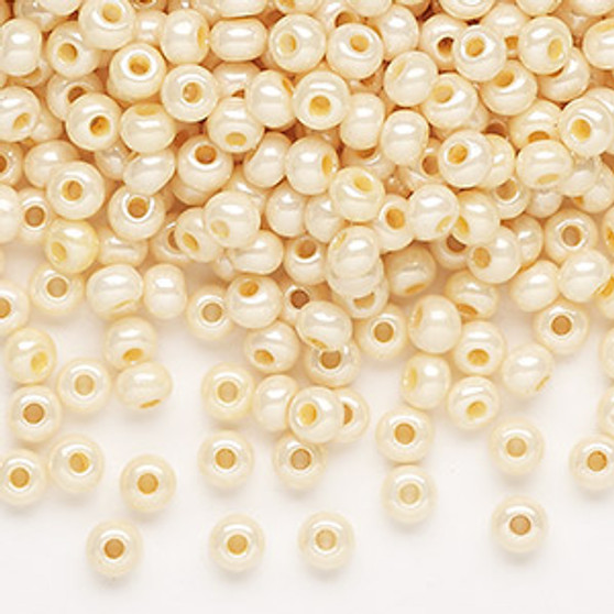 Seed bead, Preciosa Ornela, Czech glass, opaque shell luster white, #6 rocaille. Sold per 50-gram pkg.