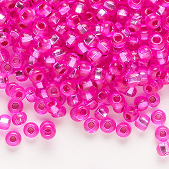 Seed bead, Preciosa Ornela, Czech glass, transparent silver-lined dark pink, #6 rocaille with square hole. Sold per 50-gram pkg.