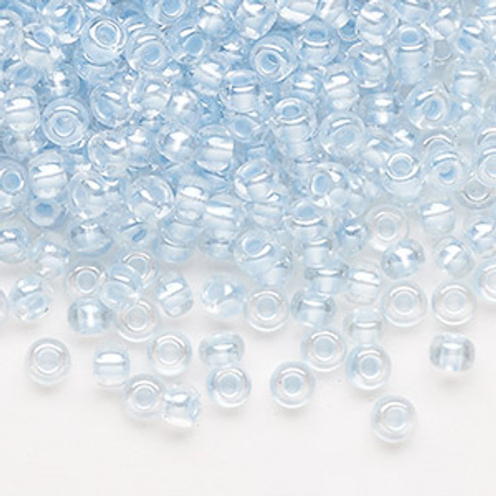 Seed bead, Preciosa Ornela, Czech glass, translucent color-lined pastel blue luster (382PB), #6 rocaille. Sold per 50-gram pkg.