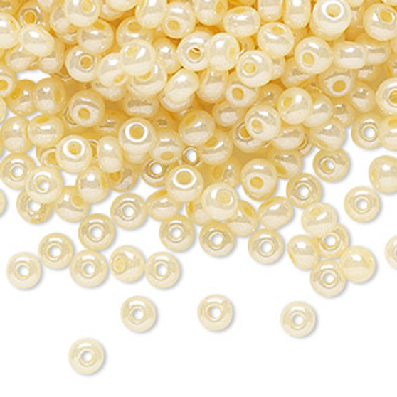 Seed bead, Preciosa Ornela, Czech glass, opaque luster light cream pearl, #6 rocaille. Sold per 50-gram pkg.