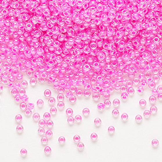 Seed bead, Preciosa Ornela, Czech glass, transparent pink-lined luster crystal clear, #11 rocaille. Sold per 50-gram pkg.