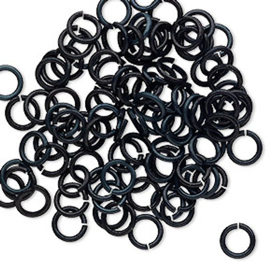 Jump ring, anodized tempered aluminum, black, 6mm round, 4.2mm inside diameter, 18 gauge. Sold per pkg of 100.