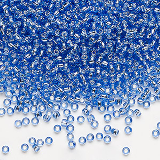 Seed bead, Dyna-Mites™, glass, silver-lined transparent light blue, #11 round. Sold per 40-gram pkg.