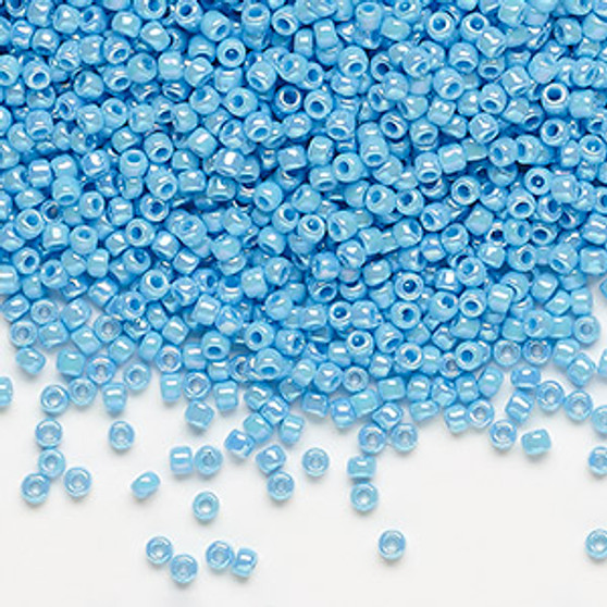 Seed bead, Dyna-Mites™, glass, opaque rainbow turquoise blue, #11 round. Sold per 40-gram pkg.