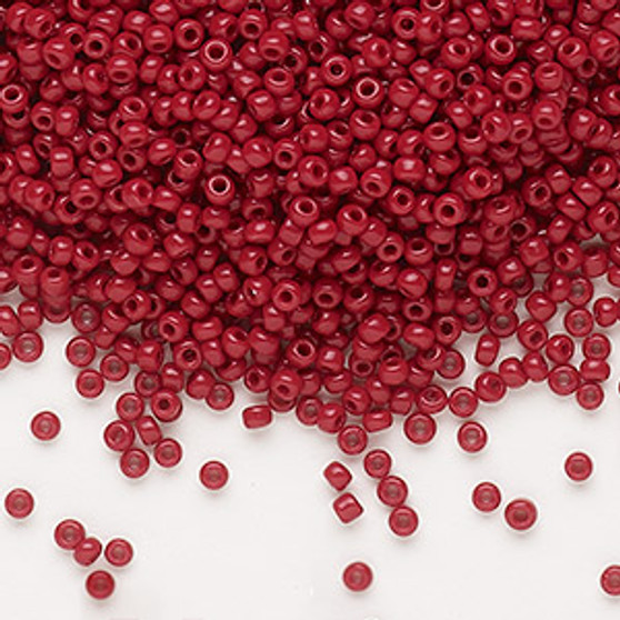Seed bead, Dyna-Mites™, glass, opaque brick red, #11 round. Sold per 40-gram pkg.