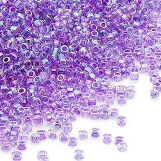 Seed bead, Dyna-Mites™, glass, transparent inside color rainbow purple, #11 round. Sold per 40-gram pkg.